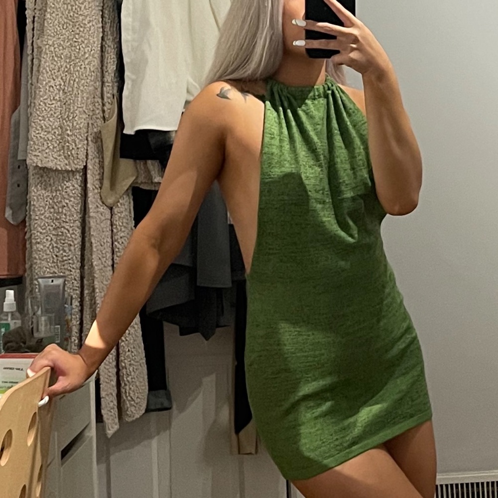Green knit halter mini dress with a open back